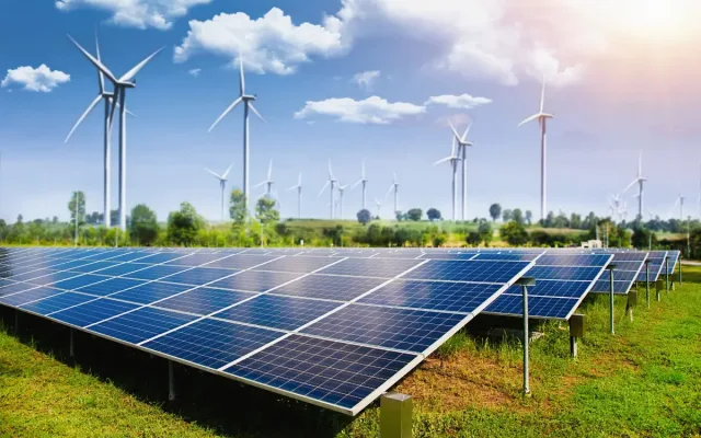 solar-panel-with-wind-turbines-against-mountains-sky-1